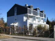 Neubau von 3 Stadthusern mit Garagen